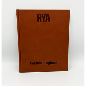 The Royal Yachting Association's RYA Personal Logbook, a brown hardcover, stands upright against a white background—ideal for documenting your journey as a Coastal Skipper or Yachtmaster.