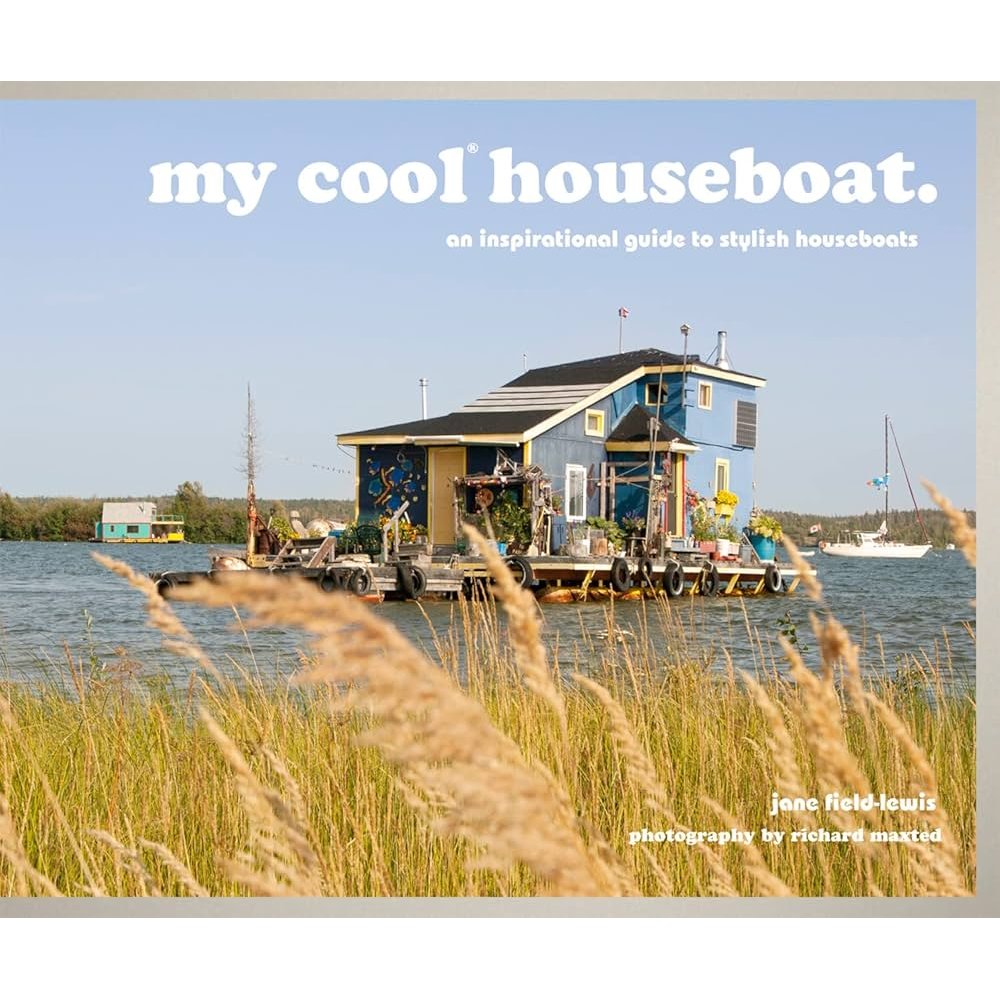 A vibrant two-story houseboat floats on a peaceful river, its deck decorated with plants. "My Cool Houseboat" by Pavilion is titled above, with author and photographer credits in the bottom right corner.