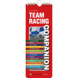 A red, rectangular spiral-bound book titled "Team Racing Companion" by Fernhurst Books, featuring a sailboat photo on the cover, a colorful contents list, and expert advice on sailing teamwork and team racing.