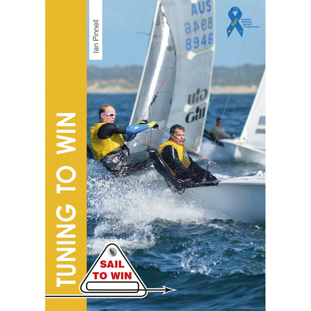 Two sailors in yellow vests race a dinghy, expertly balancing. The cover shows "Tuning To Win" by Fernhurst Books, with the "Sail to Win" logo at the bottom left.