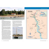 A two-page spread from the East Coast Rivers Cruising Companion by Fernhurst Books: the left shows a lively riverside Ramsholt scene with people, boats, and trees; the right displays a detailed River Deben navigation map.