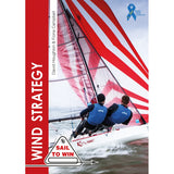 The cover of "Wind Strategy" by Fernhurst Books features two sailors in blue on the sailboat "Roxanne" with red and white sails, against an ocean backdrop. A "Sail to Win" logo appears at the bottom—ideal for dinghy sailing fans.