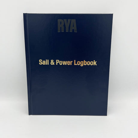 A navy blue RYA Sail & Power Logbook by the Royal Yachting Association, featuring gold and silver embossed text, stands upright against a plain white background.