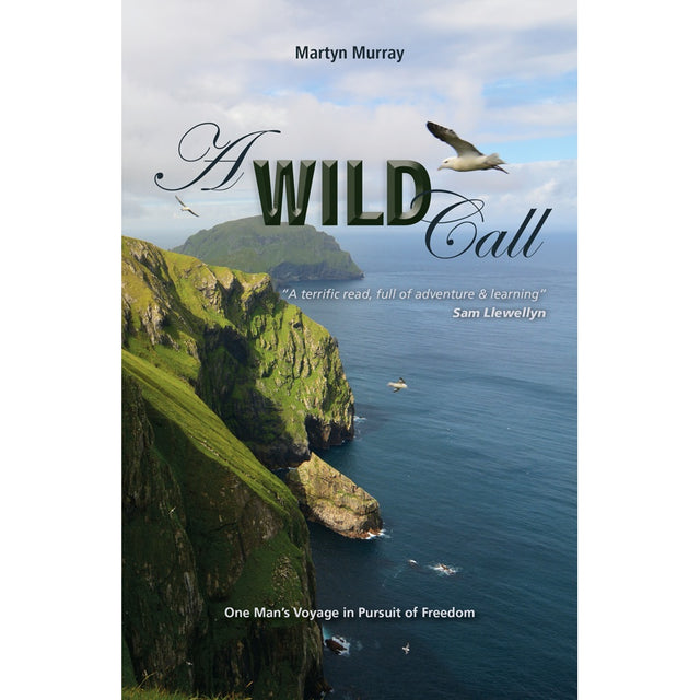 Book cover for "Wild Call" from Fernhurst Books, showing vivid green cliffs by the ocean under a cloudy sky with soaring seagulls. The design includes a review and the tagline: "One Man's Voyage in Pursuit of Freedom.