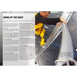 Wearing yellow and black, a person climbs a sailing boat mast using safety gear. Photographed from above, the deck and rigging are visible as they ascend to tune lines. Product: Sail and Rig by Fernhurst Books.