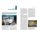 A man in a white shirt and face mask paints a boat’s interior. The page, "Chapter 14: Painting the Interior," from Fernhurst Books’ Restoration Handbook for Yachts, features step-by-step photos and text on cabin restoration.