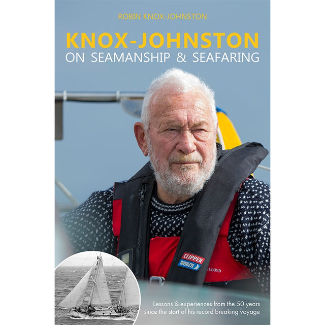 A bearded man in a red life jacket and navy sweater sits on a sailboat on the cover of "Knox-Johnston on Seamanship & Seafaring" by Fernhurst Books, with an inset photo of a vintage Golden Globe Race era sailing ship.