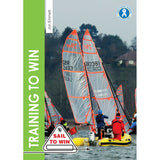 Two sailboats with transparent sails race near a yellow inflatable boat, where people observe sailing training. The book cover reads "Training To Win" by Fernhurst Books, featuring a "Sail to Win" badge in the bottom left corner.