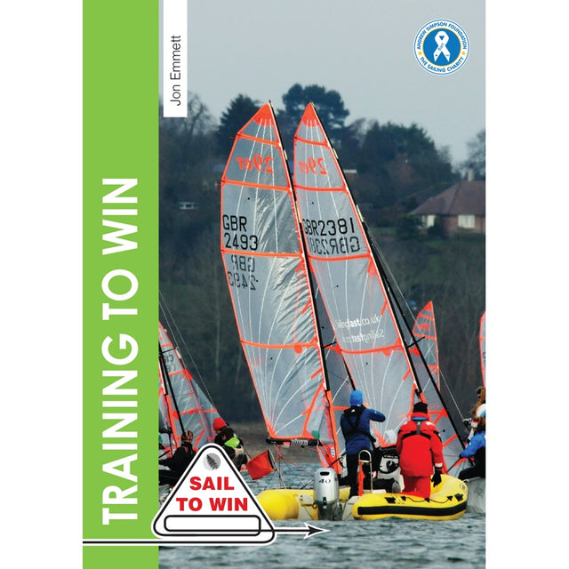 Two sailboats with transparent sails race near a yellow inflatable boat, where people observe sailing training. The book cover reads "Training To Win" by Fernhurst Books, featuring a "Sail to Win" badge in the bottom left corner.