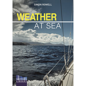 Book cover for Weather at Sea from Fernhurst Books. The image features a sailboat navigating rough, dark blue waves under dramatic skies—a fitting choice for this practical sailing weather guide for sailors.