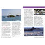 A guidebook spread from Fernhurst Books' "North Brittany & Channel Islands Cruising Companion" features text and three photos—a fortified island, a lively marina, and low-tide coast—perfect for North Brittany cruising and packed with pilotage info.