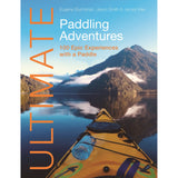 A yellow kayak floats on a misty lake amid mountains and trees. The book cover shows "Ultimate Paddling Adventures" by Fernhurst Books, featuring 100 epic experiences at top paddling destinations.