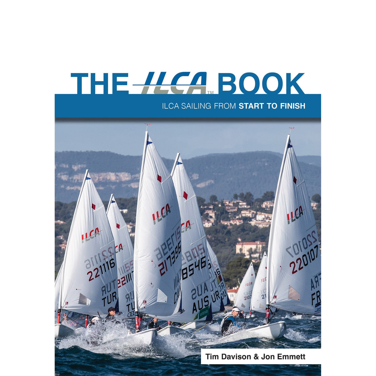Cover of ILCA Book by Fernhurst Books shows several ILCA dinghies racing with numbered white sails, buildings and hills in the background. Authors Tim Davison & Jon Emmett are listed at the bottom.