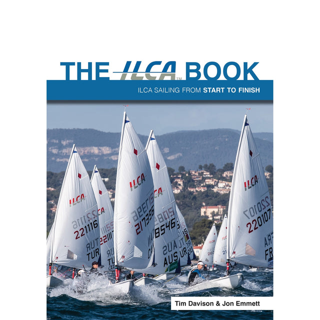Cover of ILCA Book by Fernhurst Books shows several ILCA dinghies racing with numbered white sails, buildings and hills in the background. Authors Tim Davison & Jon Emmett are listed at the bottom.