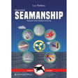 Illustrated Seamanship" by Fernhurst Books features nautical icons—knots, ropes, and an anchor—within circular frames on a blue sea-patterned cover, making it ideal for learning yacht seamanship and rope handling.