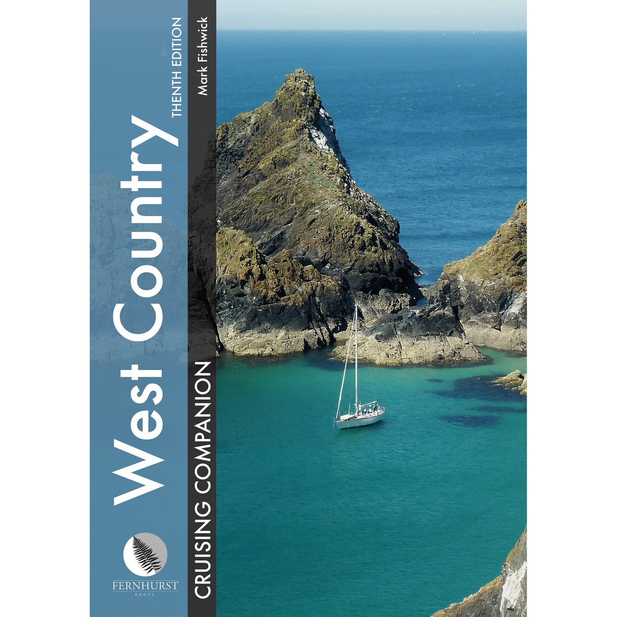 A white sailboat drifts on turquoise water by rocky cliffs under a blue sky. Text reads "West Country Cruising Companion, the essential south west England sailing guide," from Fernhurst Books.