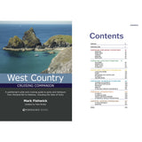 The image displays the cover of "West Country Cruising Companion" by Fernhurst Books, featuring a coastal scene with rocky cliffs and a lighthouse, next to a table of contents listing chapters and page numbers.