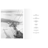 A black-and-white Frank Hurley photograph of a ship’s mast over an ice-covered sea, next to the table of contents for The Endurance Photographs by Riverside Press.