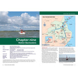 Open pages of the East Coast Rivers Cruising Companion showing a nautical map of Walton Backwaters, alongside navigational charts, tidal information, and instructional text from the pilotage and navigational guide.