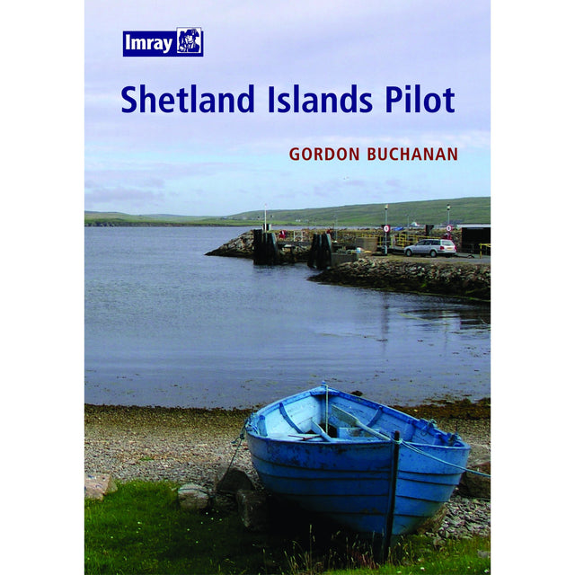 The cover of "Shetland Islands Pilot," an Imray publication by Gordon Buchanan, features a serene scene with a blue boat resting on a grassy shore overlooking a calm sea. A pier and distant coastline are visible under a cloudy sky, emphasizing the Shetland Islands as an idyllic cruising ground with picturesque anchorages. The Imray logo is prominently displayed in the top left corner.