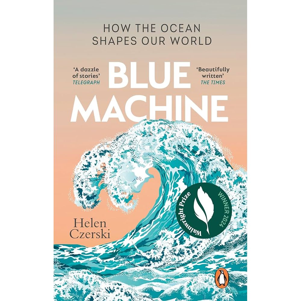 The cover of "Blue Machine" by Helen Czerski, published by Penguin Books, features an illustration of a large ocean wave on a gradient from orange to blue, with quotes from The Telegraph and The Times, plus a small logo denoting an award win.