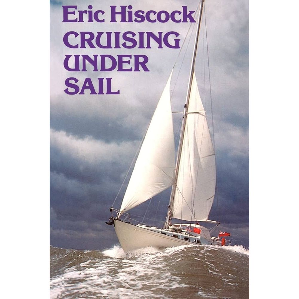 A sailboat masterfully showcases seamanship in choppy waters under a clouded sky, with its full sails catching the wind and the British flag waving at the stern. At the top, it reads: "Eric Hiscock CRUISING UNDER SAIL" by Adlard Coles.