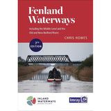 Book cover for "Fenland Waterways" by Chris Howes, the 7th edition. The illustration showcases a tranquil scene of a boat navigating a river with a metal bridge in the distance. It highlights the Middle Level and Old and New Bedford Rivers. The cover features logos for Inland Waterways and Imray, the brand behind this comprehensive navigation guide.