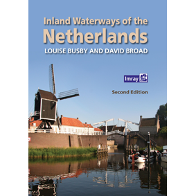 Cover of Imray's "Inland Waterways of the Netherlands" shows a Dutch windmill, canal, boats, and drawbridge under a clear sky—ideal for planning your Netherlands waterways cruising adventure.