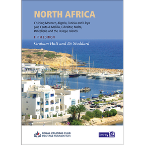 The "North Africa" book cover by Imray shows a Mediterranean coast with white buildings, palm trees, yachts, and blue sea. Featuring Imray harbour plans and logos, it's ideal for Mediterranean sailing guides.