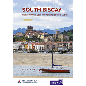A red and white sailboat rests by the shore of a Spanish town with mountains behind. The cover reads: "South Biscay" by Steve Pickard, Eighth Edition—your South Biscay pilot from Imray.