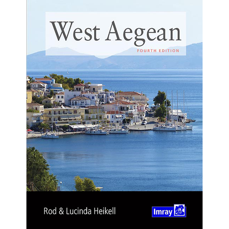 Cover of the book "West Aegean" by Rod & Lucinda Heikell, published by Imray, fourth edition. The image depicts a picturesque coastal village with sailboats docked along the waterfront and buildings with red-tiled roofs. The blue sea and distant mountains in the background capture the charm of both the Cyclades and Northern Sporades.