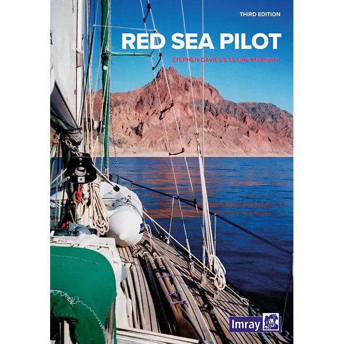 The cover of the "Red Sea Pilot [PRE-ORDER]" from Imray, third edition by Stephen Davies and Elaine Morgan, features an essential navigation guide with a sailing vessel on tranquil waters, set against the backdrop of rugged, reddish mountains.