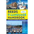 Cover of the Reeds 9-Language Handbook showcasing sailboats and sailors. The cover includes text listing languages: English, French, Danish, Dutch, German, Spanish, Italian, Portuguese, and Greek. This practical handbook from Reeds enhances multilingual communication for sailors.