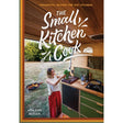 Cover of "The Small Kitchen Cook," a book by Exploring Eden Media featuring Ashleigh Butler, who demonstrates innovative cooking methods in a van's compact kitchen amidst lush greenery. The title cleverly incorporates cooking utensils, and an outdoor grill can be seen in the background.