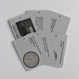 Five "Flip Cards - GMDSS Marine Radio" scattered on a white surface. Each card contains text and images related to maritime safety. Visible questions include topics on GMDSS, safety messages, SOLAS-SART, and RADAR, with some text partially obscured.