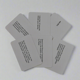 Six Flip Cards - GMDSS Marine Radio are arranged in a loose fan pattern on a white surface. Each card contains printed text with various informational statements or instructions related to navigation and safety, such as "Less than 10 seconds," "Search and Rescue Transponder," and others, essential for the General Operators Certificate.