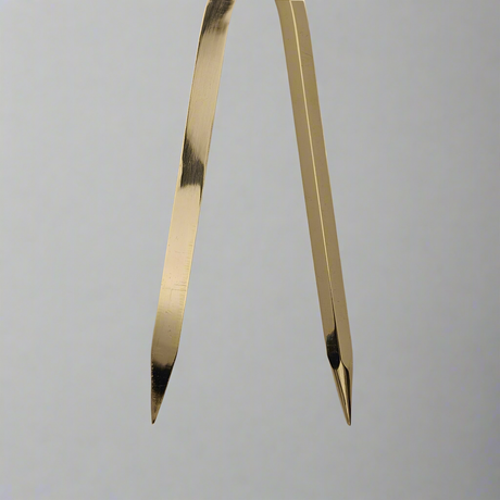 Close-up view of a pair of Chartwright 8" Single-Handed Brass Dividers with sharp, pointed tips against a plain gray background. The precision instrument is partially opened, showcasing its polished metallic surface.