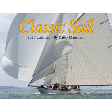 A sailboat with white sails full of wind on the ocean, featuring the Classic Sail 2027 Calendar by Kathy Mansfield overlaid on the image.