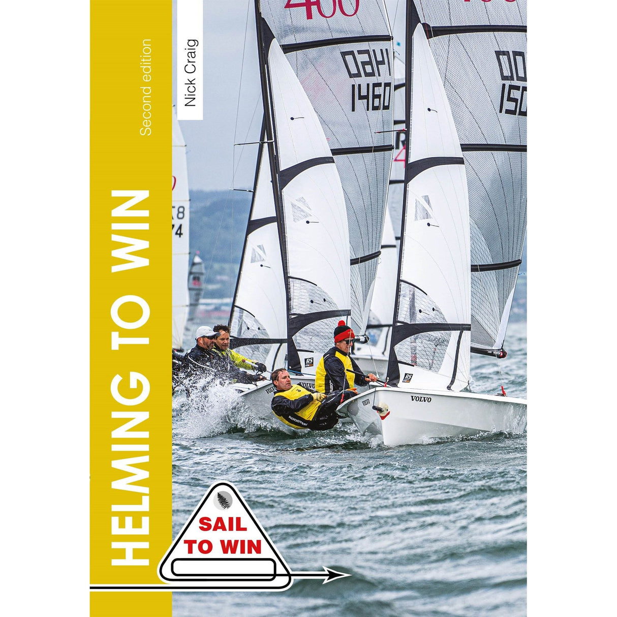 Sailors in yellow jackets navigate turbulent waters in a championship race on the cover of Fernhurst Books' "Helming to Win," featuring a triangular "Sail to Win" logo with a cloudy sky and distant shoreline, emphasizing expert boat handling skills.