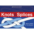 The "Knots & Splices" book by Steve Judkins & Tim Davison, published by Fernhurst Books, displays intricate splicing and ropework with expertly tied knot illustrations on a calming blue cover.