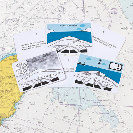 The Flip Cards: Sailor Essentials Set by Flip Cards is displayed, featuring five illustrated instruction cards on top of a nautical map. These cards include diagrams focused on sailing skills and IALA buoyage, with some instructional text visible.