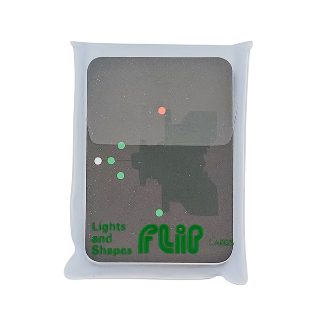 The "Flip Cards: Lights and Shapes" by Flip Cards, ideal for mariners needing a reference on navigation lights or daytime shapes, are packaged in a translucent white plastic pouch. The top card features abstract shapes and dots in red and green, along with the words "Lights and Shapes" and "Flip Cards" printed in green.