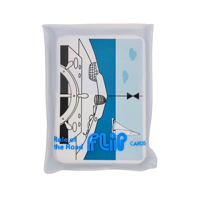 A deck of cards named "Flip Cards: Rule of the Road" by Flip Cards is enclosed in plastic packaging. The top card displays a stylized illustration featuring a steering wheel and a directional arrow, ideal for mastering traffic scenarios and learning the collision rule.