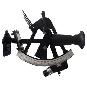 The Freiberger Präzisionsmechanik Freiberger Yacht Sextant is a black sextant with a metallic arc (0–140°), mirrors, filters, and telescope, used for measuring angles in celestial navigation.