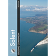 The book cover of "Solent Cruising Companion" by Fernhurst Books features an aerial view of the Solent coastline, showing cliffs, sea, and countryside beneath a blue sky. It includes essential pilotage information for navigation enthusiasts.