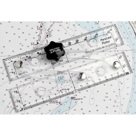 A Weems & Plath ParaLock Plotter is placed on a nautical chart map. The clear ruler features various measurement markings and a central knob labeled "Weems & Plath." The map beneath, essential for navigation with paper charts, shows water depths and navigational details.